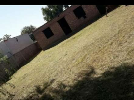 EN VENTA LOTE CON CASA A TERMINAR. ZONA CASA QUINTAS.- CHACABUCO. COD. 150