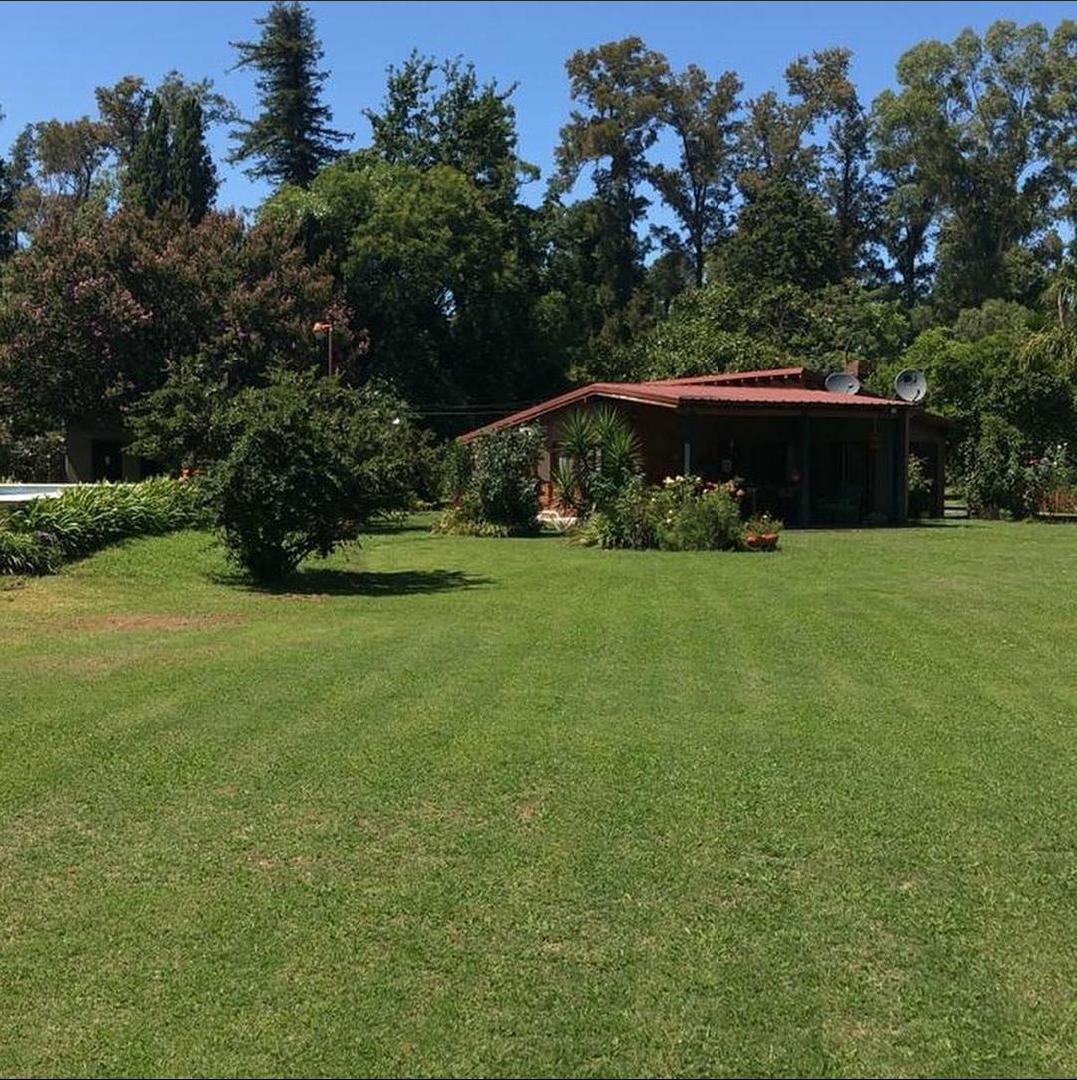 EN VENTA, HERMOSA CASA QUINTA SOBRE RUTA N°7.- CHACABUCO. COD.  132